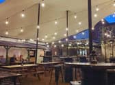 The illuminated stretch tent canopy over Watergate Yard, Sleaford. EMN-210603-140142001