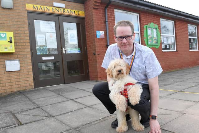 Deputy head Ricki Danks with the new school therapy dog.