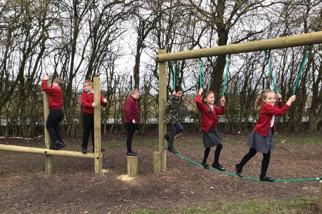 Children playing together at Boston West today