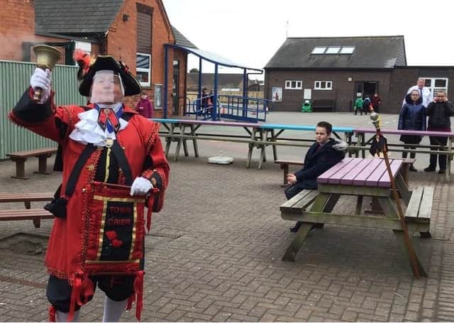 Town Crier David Summers at Sutton on Sea Community Primary School earlier this week.