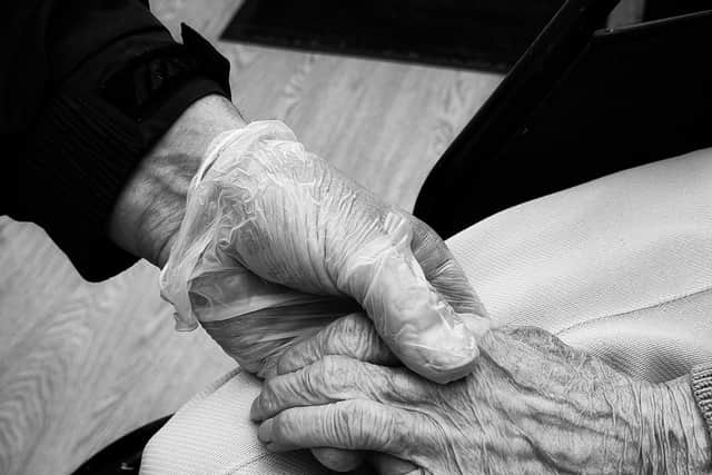 Being able to hold hands is a milestone moment at care homes.