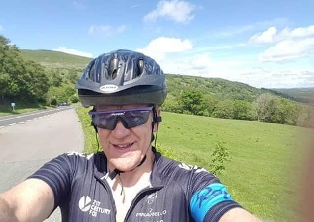 On his cycle challenge. Lofty Holmes. EMN-210903-163936001
