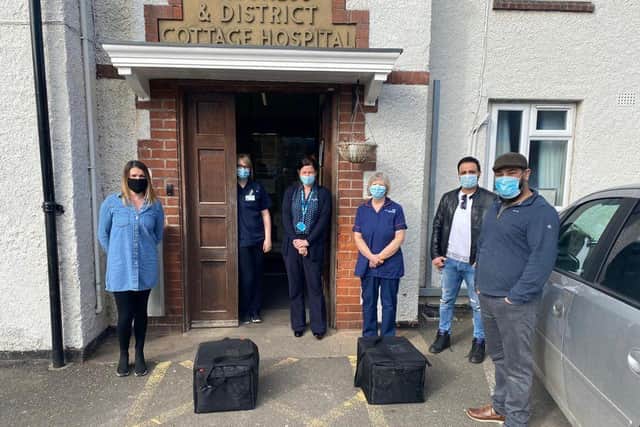 Skegness Hospital staff receiving free meals from Sunny Singh of Downtown Pizza in Ingoldmells