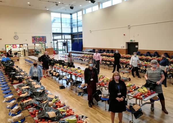 St George's Academy was distributing 165 food parcels a week during lockdown.
