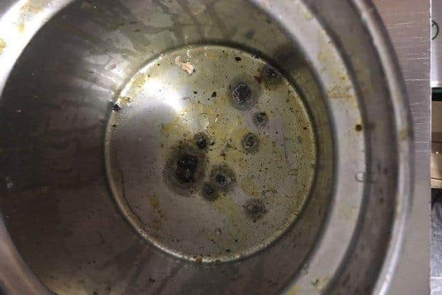 Unclean equipment identified during the inspection.
