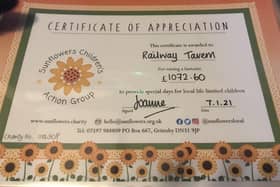 The Railway Tavern in Aby raised and donate more than £1,000 to charity.