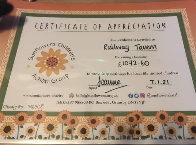 The Railway Tavern in Aby raised and donate more than £1,000 to charity.