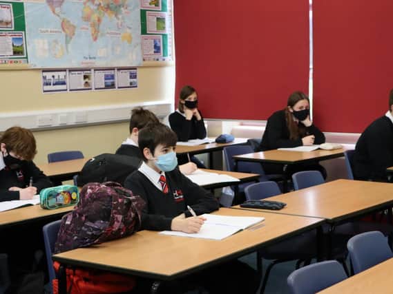 Back at school, albeit with masks and testing, at Haven High Academy