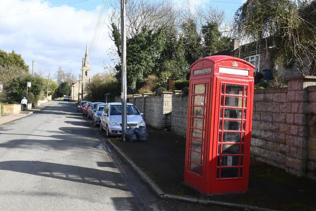 The red phone box in Wilsford EMN-210317-180144001