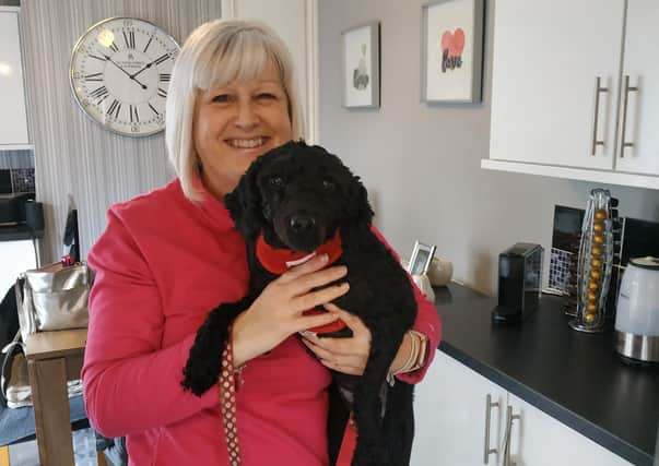 Maria and her dog Belle ready to 'Walk All Over Cancer'.