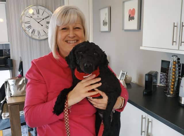 Maria and her dog Belle ready to 'Walk All Over Cancer'.