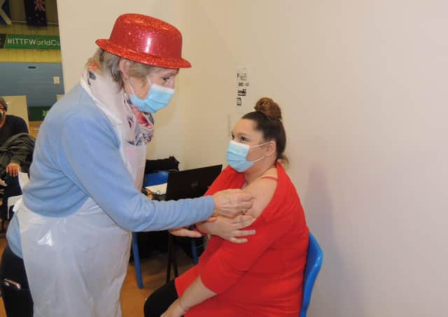 Retired GP, Dr Caroline Lawrenson administers her next vaccination. EMN-210322-175337001