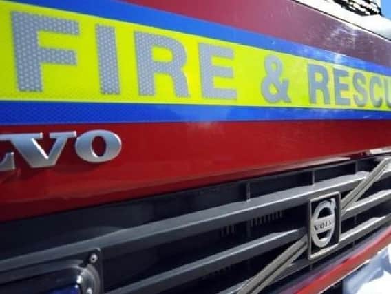 Three fire crews were called to the car sales business near Heckington.