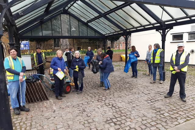 Some of the volunteers who turned out for the socially distanced tidy up EMN-210321-163925001