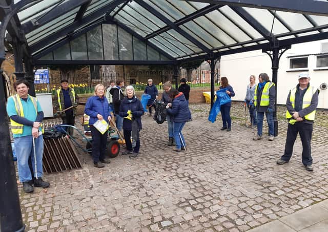 Some of the volunteers who turned out for the socially distanced tidy up EMN-210321-163925001