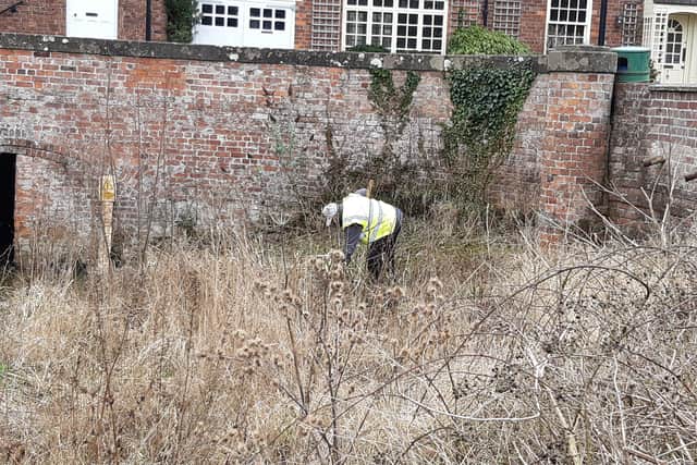 Ken Pilley begins the clearance of the bank EMN-210323-062935001