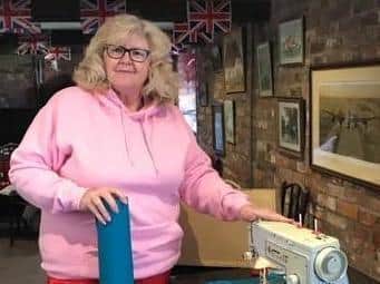 Janet Simpson was offered the Village Church Farm Museum in Skegness as a base to cut out the fabric for volunteers busy sewing scrubs in their homes.