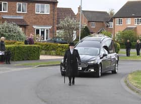 An emotional funeral procession begins for Jeannette Field, watched by neighbours in Skegness.