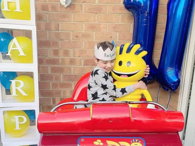 Harper with Modhesh in his garden, thanks to Fantasy Island in Ingoldmells.