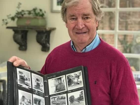 Malcolm Barnsdale with the album he would like to return.