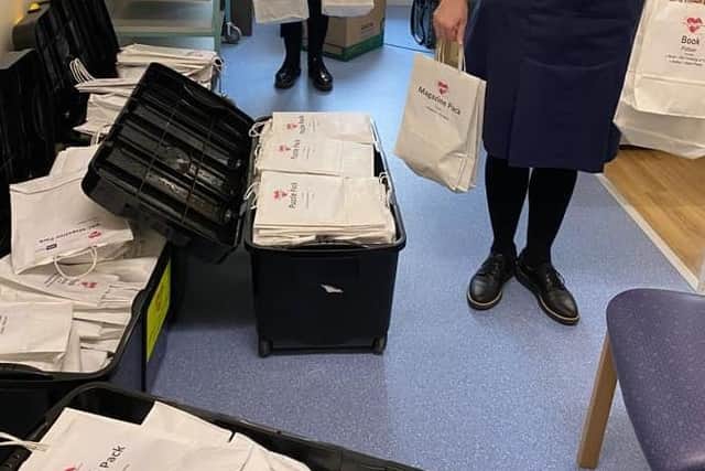 Staff at United Lincolnshire Hospitals Trust receive the gift packs to hand out. EMN-210323-171249001