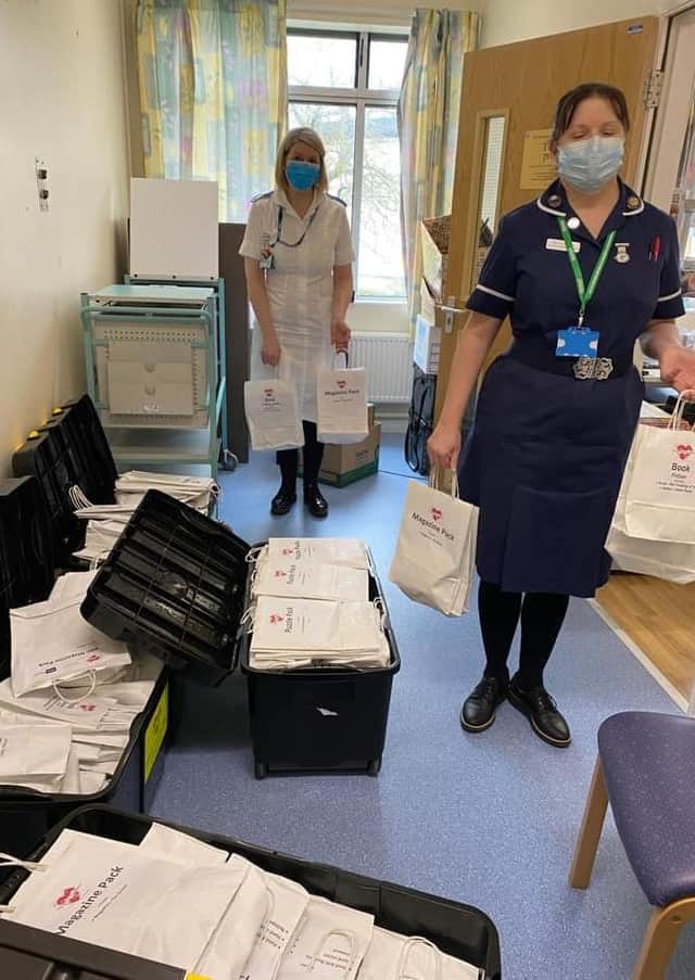 Staff at United Lincolnshire Hospitals Trust receive the gift packs to hand out. EMN-210323-171249001