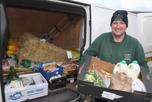 Leasingham Manor Farm Shop & Garden Centre and The Ploughmans Barn, Danny Lidsey loading deliveries for those who are self isolating. EMN-210323-114032001