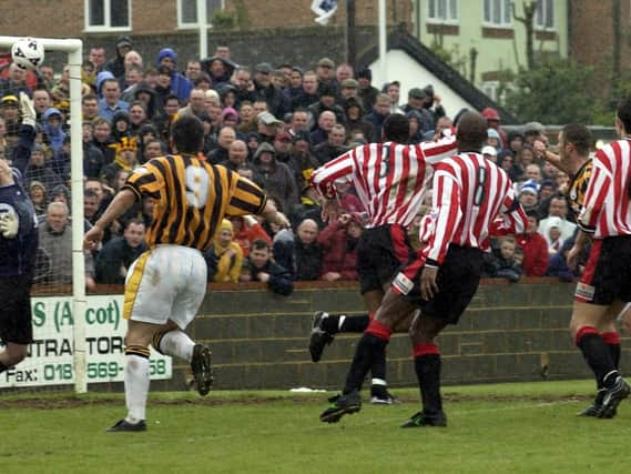 Ray Warburton heads home United's second at Hayes.