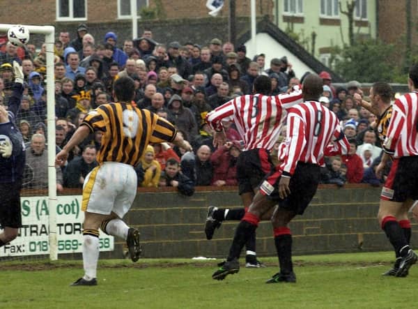 Ray Warburton heads home United's second at Hayes.