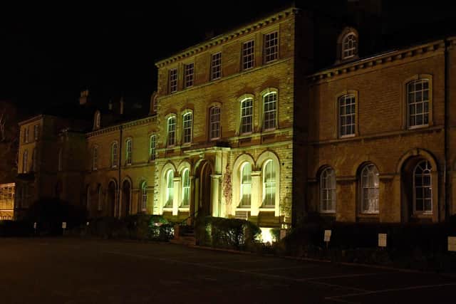 NKDC offices lit up yellow for day of reflection EMN-210324-101006001