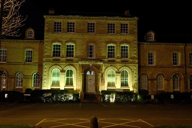NKDC offices lit up yellow for day of reflection EMN-210324-101028001