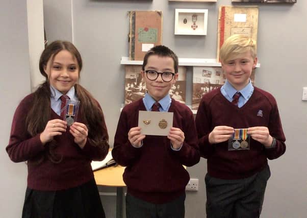 William Alvey School Year 6 pupils who helped launch the campaign to buy back William and Charles Penson's war medals have been invited to a memorial service in Hull on the anniversary of the airship crash. They are Ithar Belazizia, David Garcia and Oliver Kirkman. EMN-210324-183700001