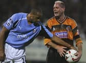 Paul Gascoigne doesn't want to let Alain Goma get on with the game. Photo: Getty Images