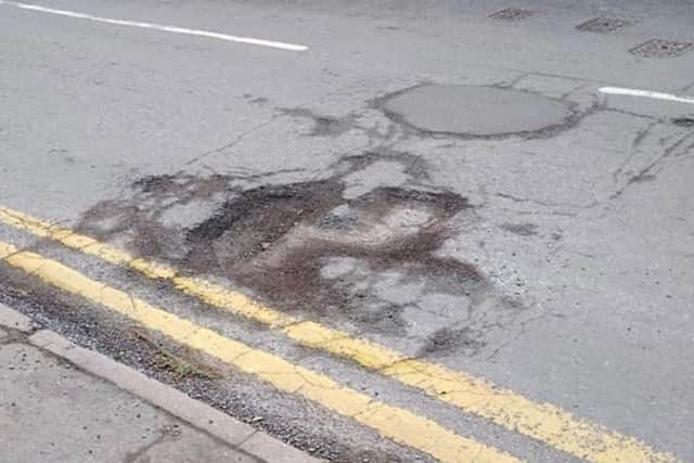 Some of the bad potholes on West Banks, Sleaford. EMN-210326-171806001