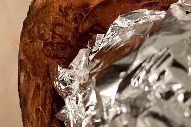 The medium sized egg consists of 35% milk chocolate with Difference Coffee Jamaica Blue Mountain beans and hazelnut crumble and is wrapped entirely in edible silver leaves. EMN-210329-123918001