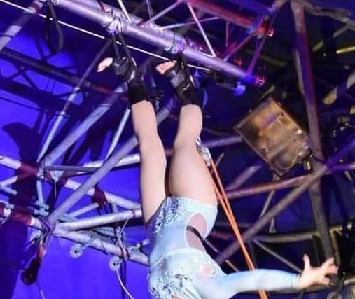 Aerial acrobatic Nikkiita Mclusky doing her 'skywalk' act. EMN-210329-152706001