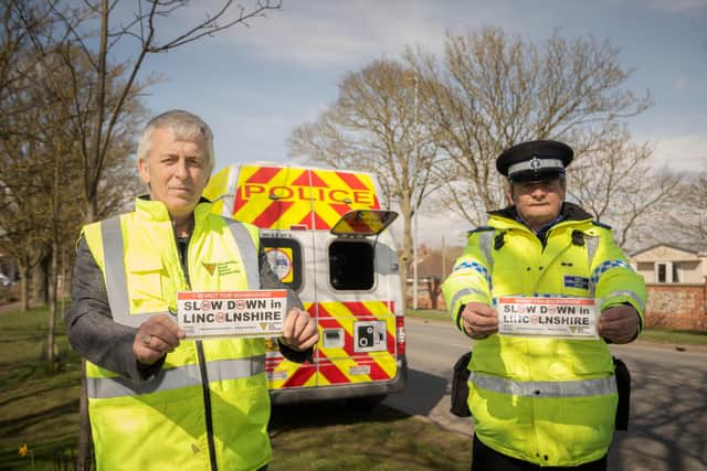 John Siddle from the Lincolnshire Road Safety Partnership and PCSO Dave Bunker with their bumper stickers for the new campaign they want drivers to get behind. EMN-210330-160205001