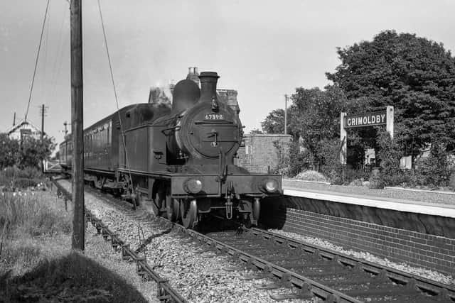 Class C12 4-4-2T No. 67398 (displaying a Louth shed plate – 40C) at Grimoldby station in early 1950s, with a service for Louth