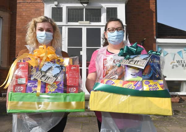 RAF Cranwell donate two Easter Egg hampers to Ashdene Care Home. L-R Laura Cook - deputy manager, Jilly Hunt - manager. EMN-210331-171154001