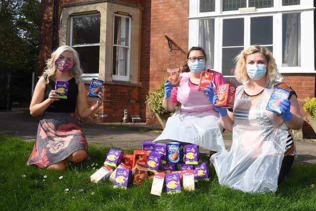 Utility Aid donates Easter eggs to Ashdene Care Home residents. L-R Sasha Oliver of Utility Aid, Jilly Hunt - manager, Laura Cook - deputy manager. EMN-210331-171204001