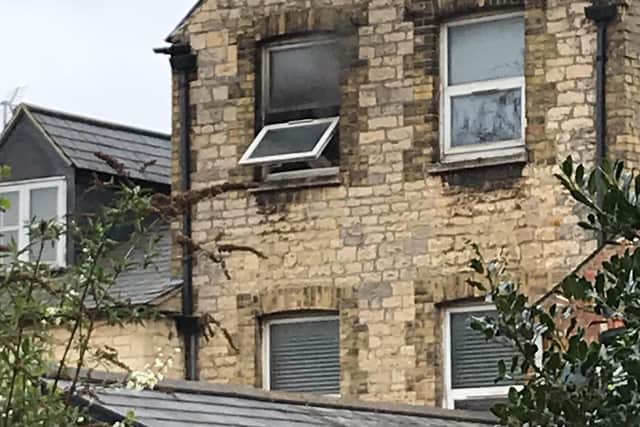 A view of the smoke-damaged window that Josephine spotted and raised the alarm. EMN-210204-152716001