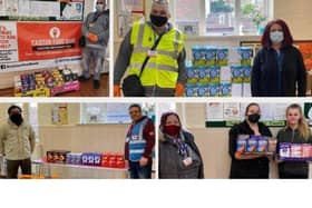 Some of the food bank volunteers with the Easter treats EMN-210504-101047001