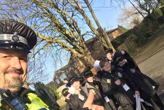 PCSO Nigel Wass pictured with some of the 'Mini' Police.