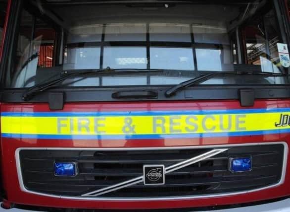 The fire service rescued three people and a baby from a lift in Wellingborough