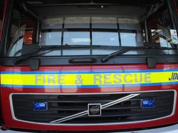 The fire service rescued three people and a baby from a lift in Wellingborough