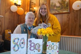 Ann Semple presented the money to Lauren Alexander-Lee