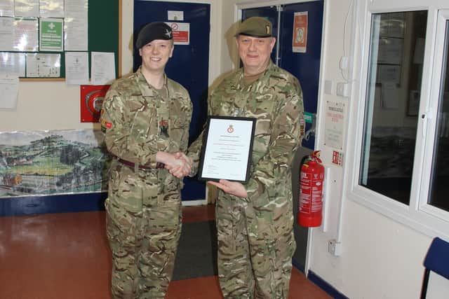 Regimental Sergeant Major Joshua Chapman pictured with Colonel Field EMN-200303-102403001