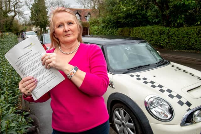 Sandy Huskison with the letter she received from Lincolnshire County Council. Picture: John Aron.