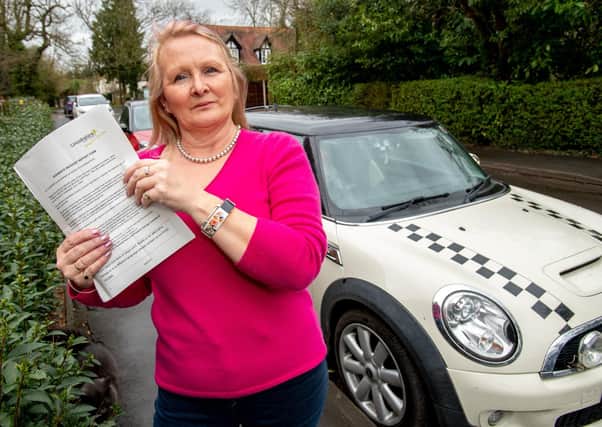 Sandy Huskison with the letter she received from Lincolnshire County Council. Picture: John Aron.