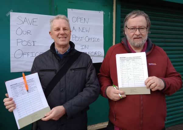 Sleaford Councillors Robert Oates and David Suiter collected hundreds of signatures in support of speeding up the replacement of the town centre post office service. EMN-201003-100844001